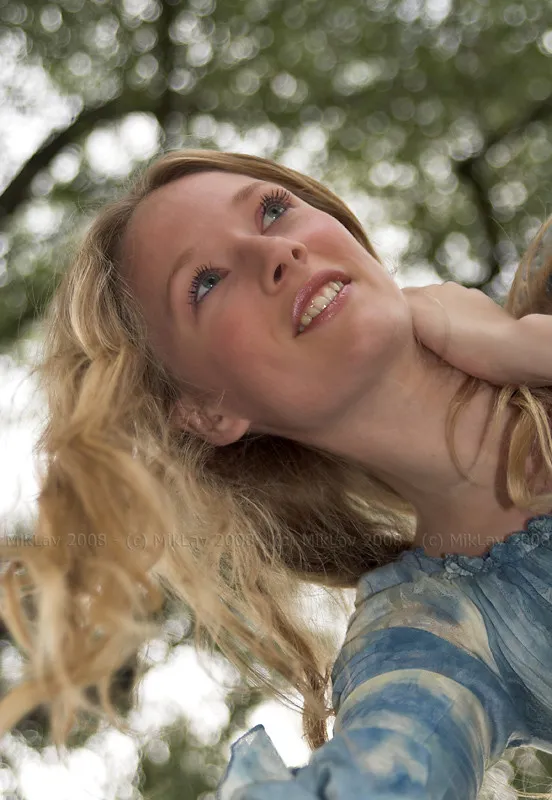 Blond girl above photographer - original