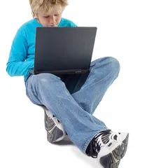Teenager boy with laptop