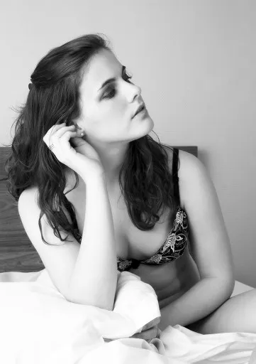Young woman in bed