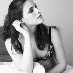 Young woman in bed
