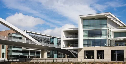 Modern buildings on the riverside of Maas river in Maastricht