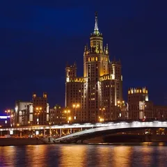 Night city (View across the river in twilight - Moscow, Russia)