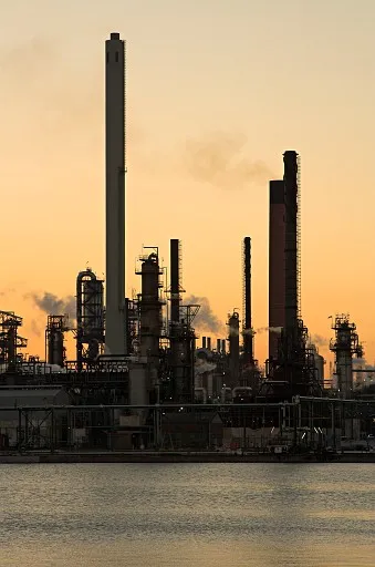 Oil refinery at sunset
