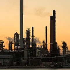 Oil refinery at sunset