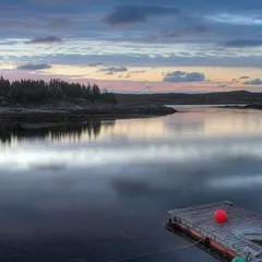 Floating fisherman pier in sunset