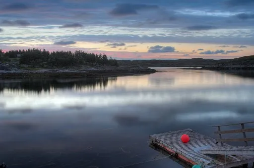 Floating fisherman pier in sunset