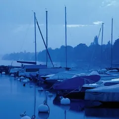 Calm yachts after sunset